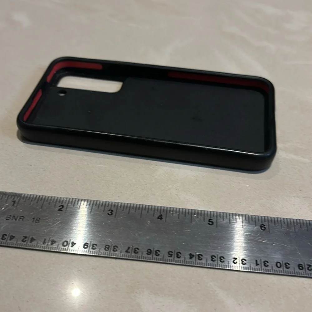 Two Samsung S22 Cases Casetify and Otterbox Black in color